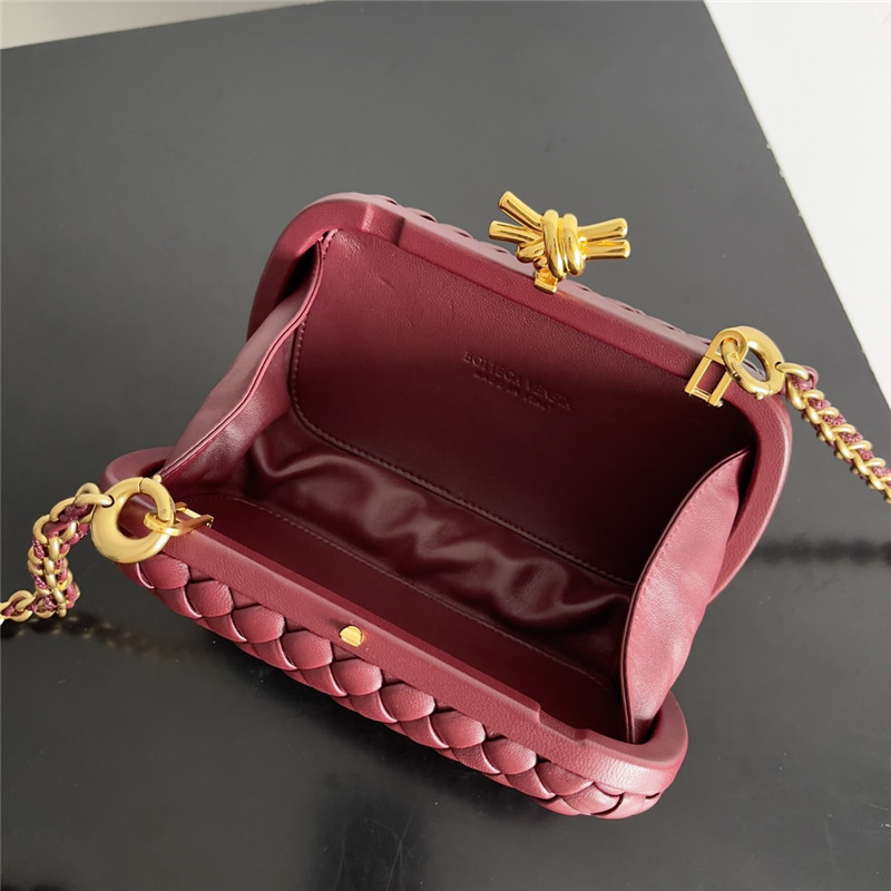 b0tt*ga Ven*ta wine red knot clutch