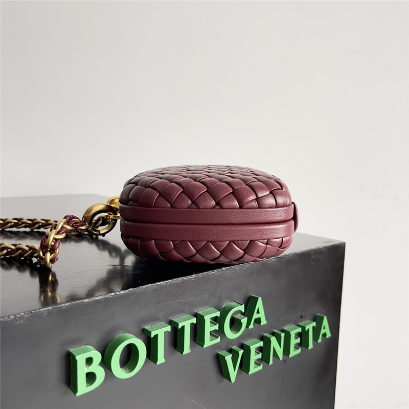 b0tt*ga Ven*ta wine red knot clutch