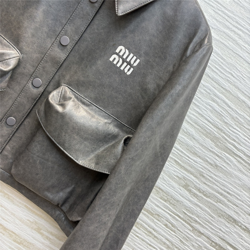 M1um1u flap lapel double pocket short leather jacket