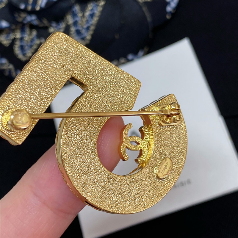 Ch**el denim 5 word double c brooch