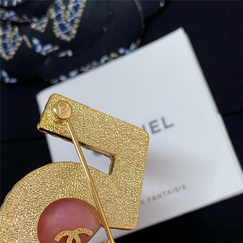Ch**el denim 5 word double c brooch