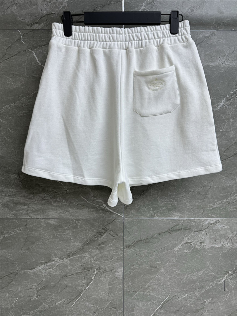 Pra*a white sports suit