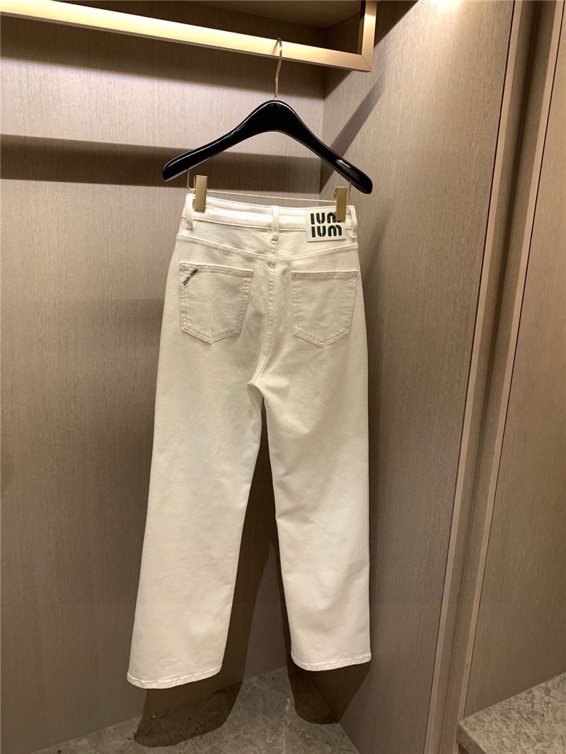 M1um1u pocket embroidered lettering jeans