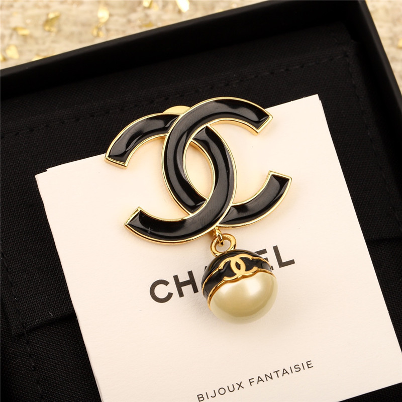 Ch**el black enamel hanging pearl brooch