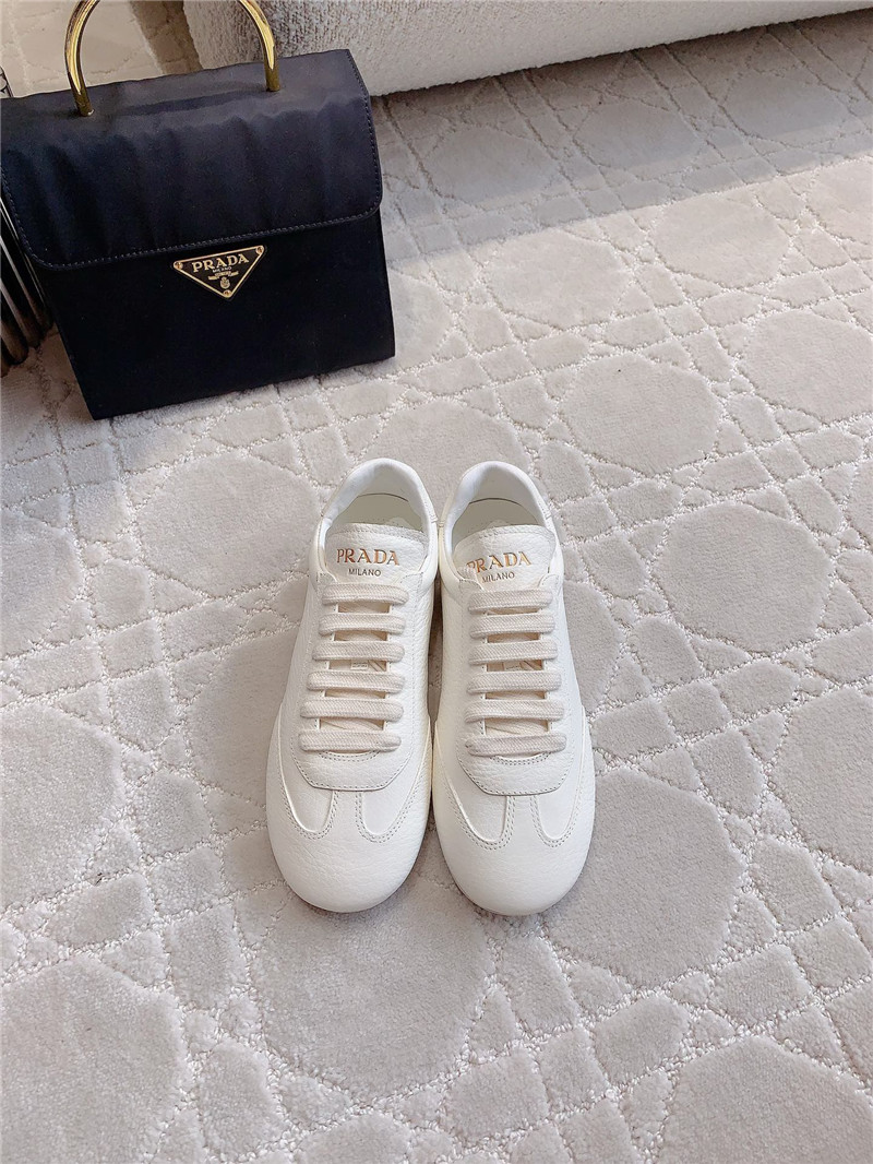 Pra*a triangle logo sneakers