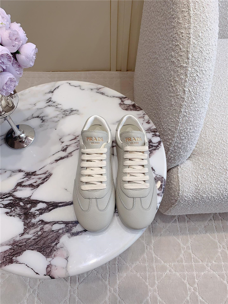 Pra*a triangle logo sneakers in gray