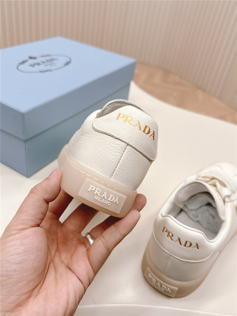Pra*a white leather sneakers for women