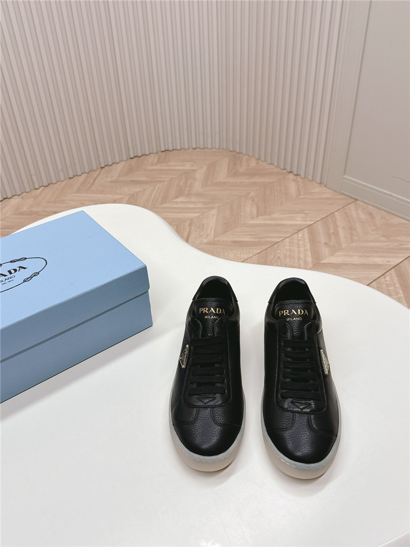 Pra*a black leather sneakers