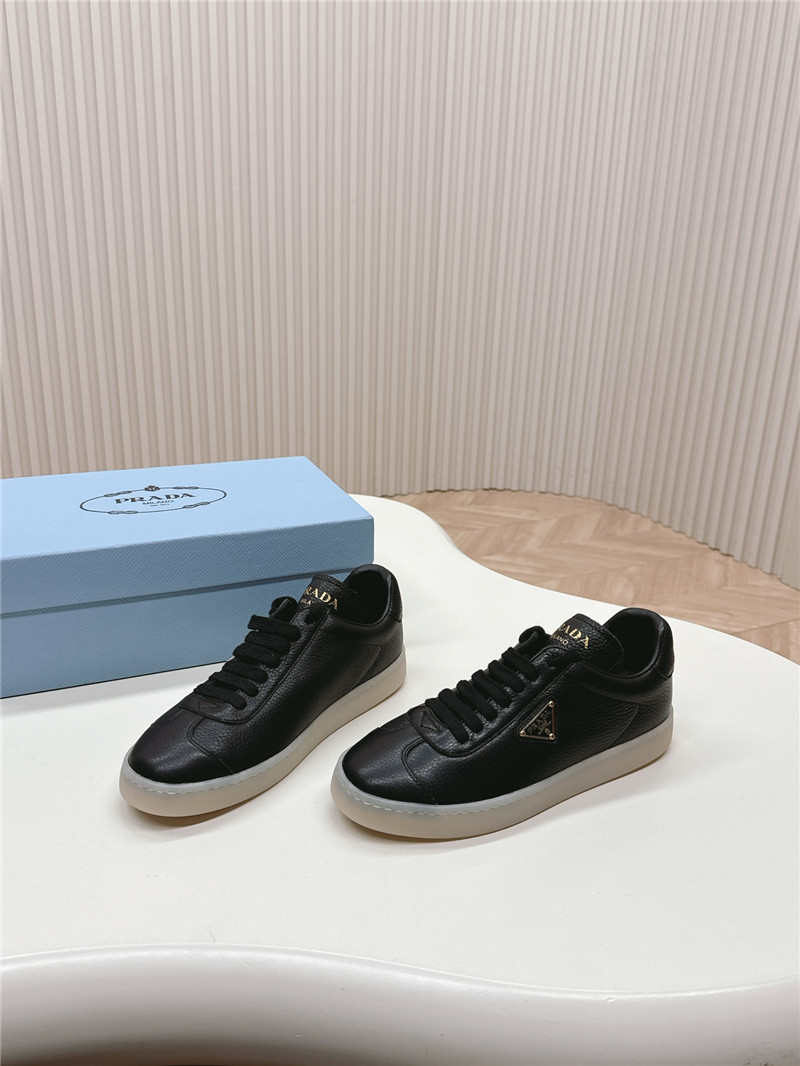 Pra*a black leather sneakers