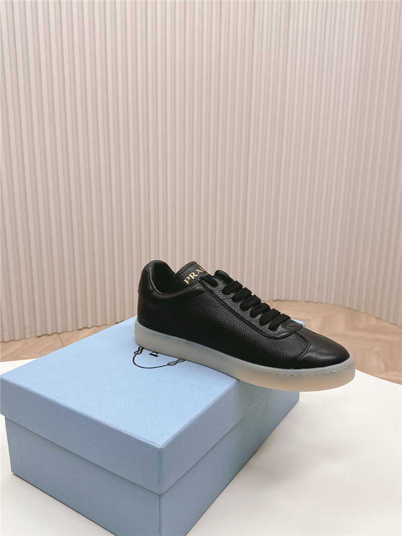 Pra*a black leather sneakers