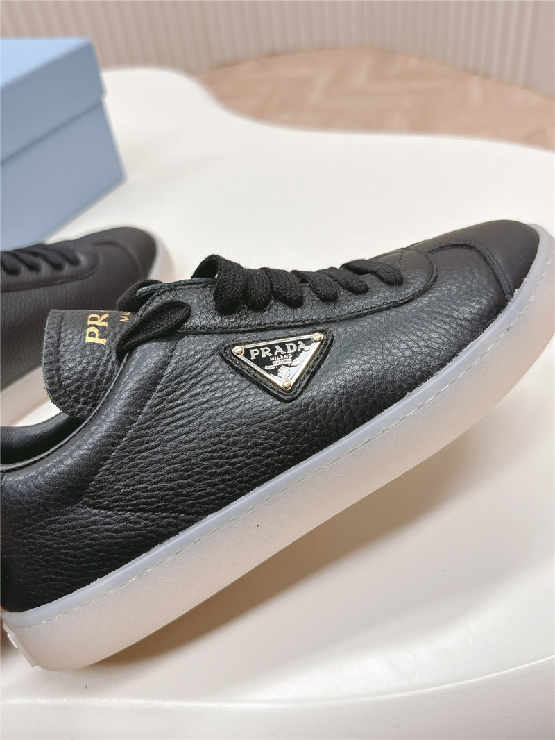 Pra*a black leather sneakers