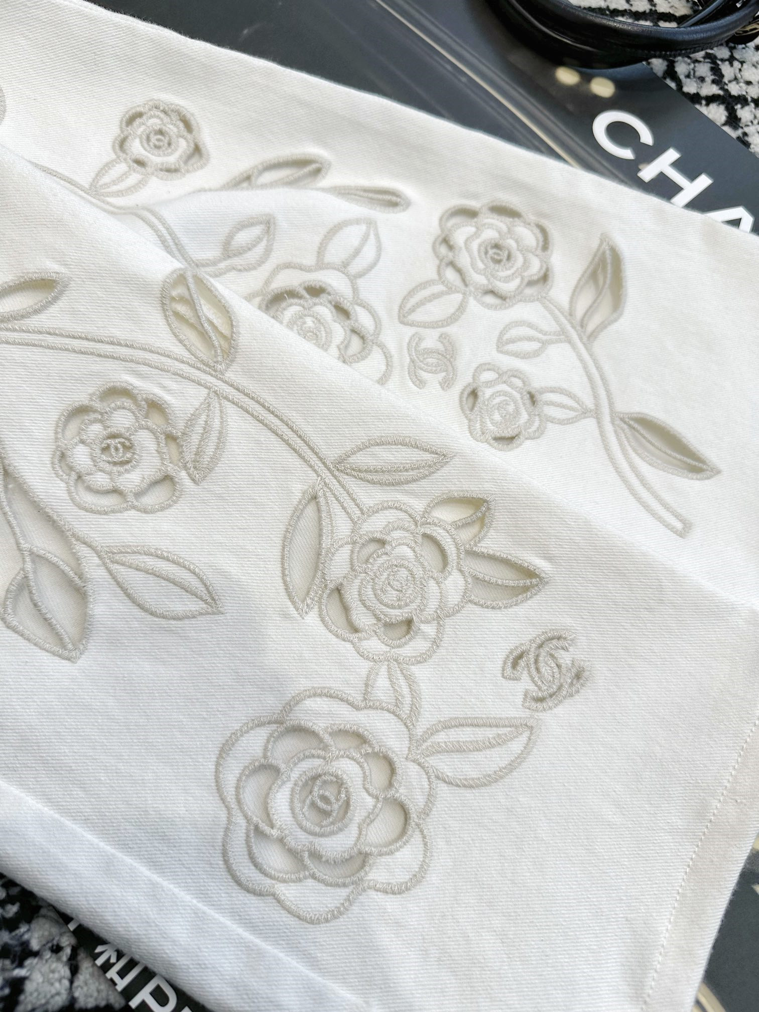 Ch**el white double pocket embroidered jeans