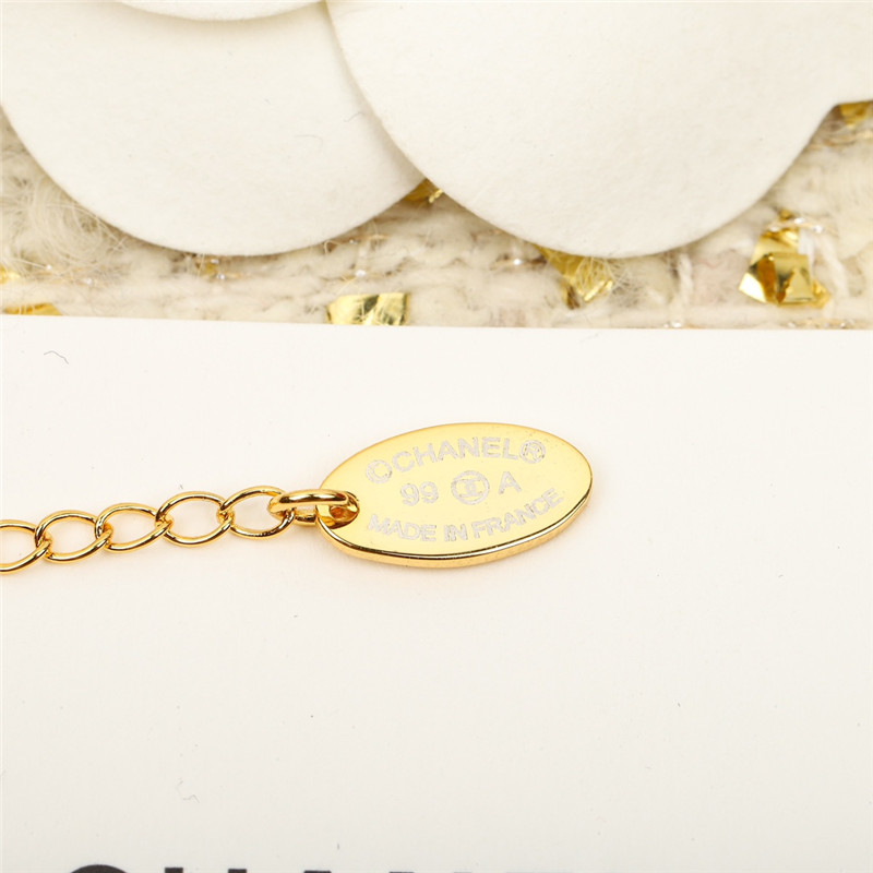 Ch**el gold c snake bone chain bracelet