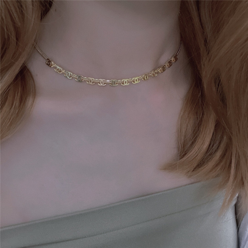 Ch**el gold c snake bone chain bracelet