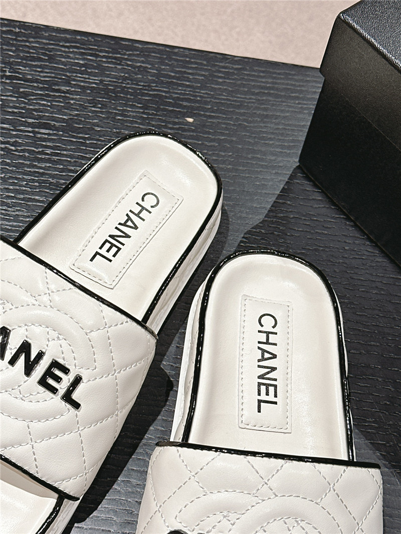 Ch**el lambskin quilted white mules