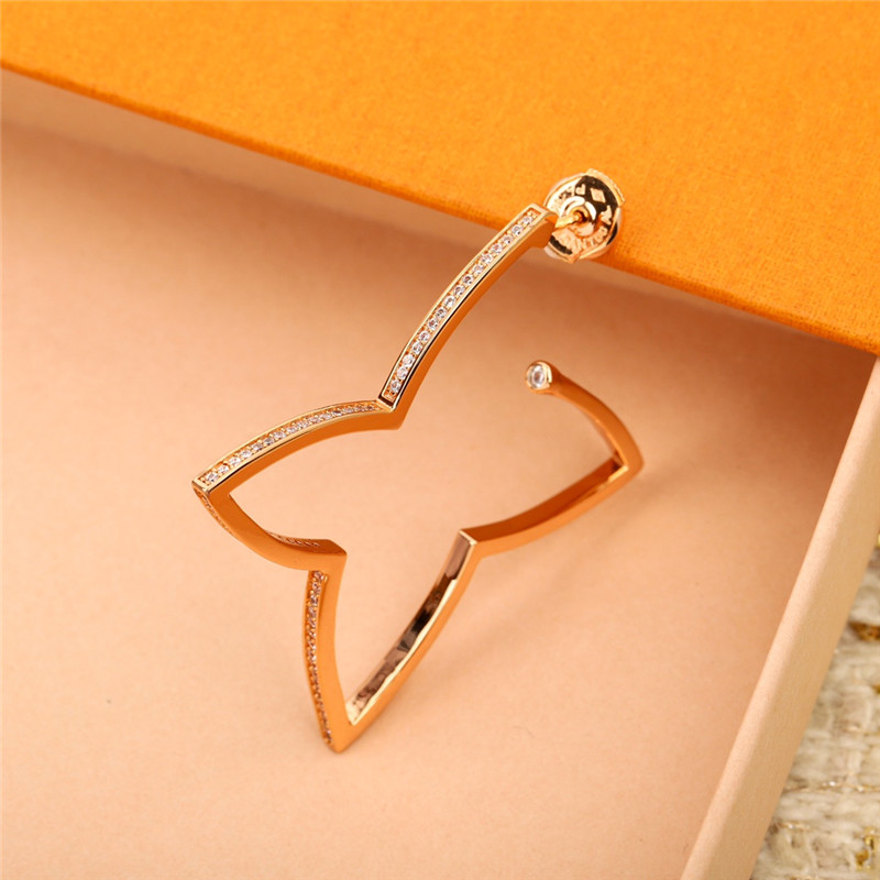 l0vis Vvtt0n lv hollow silhouette earrings