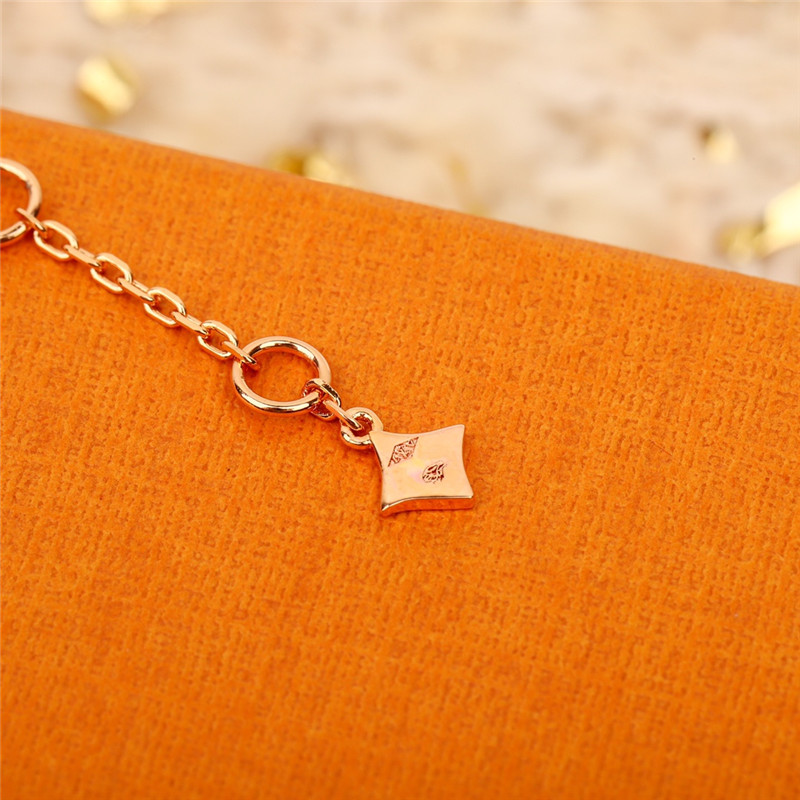 l0vis Vvtt0n lv four flower bracelet