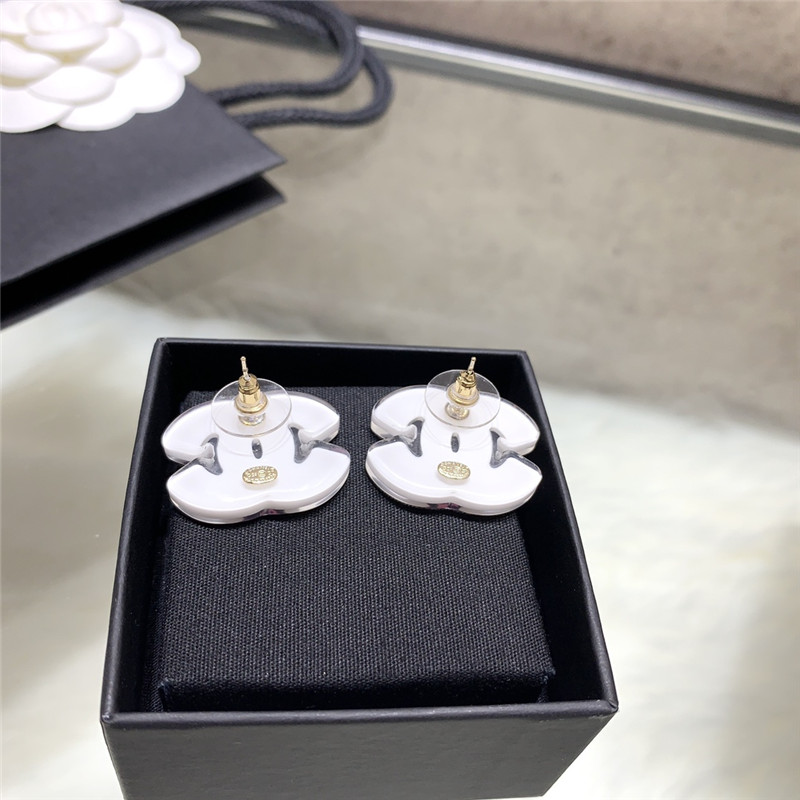 Ch**el acrylic star double c earrings