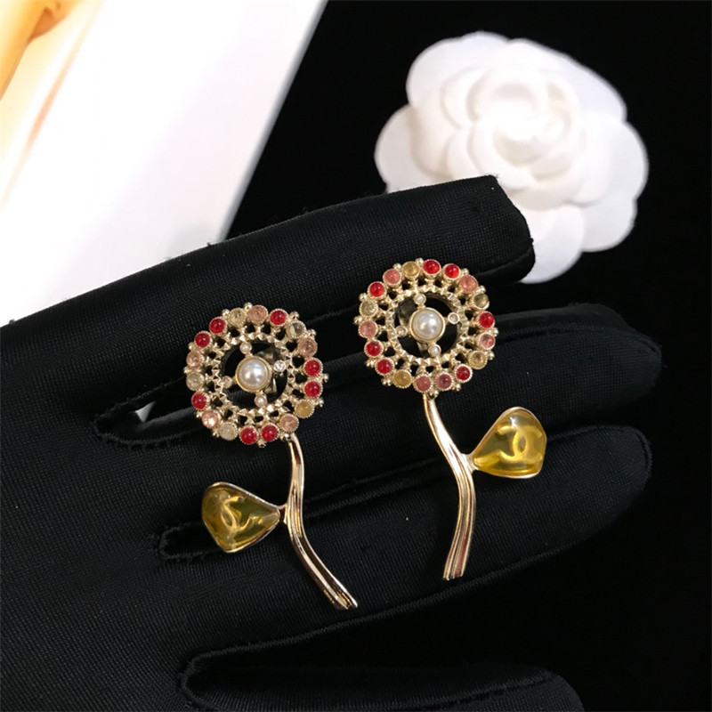 Ch**el sunflower flower pendant oil drop ear clip