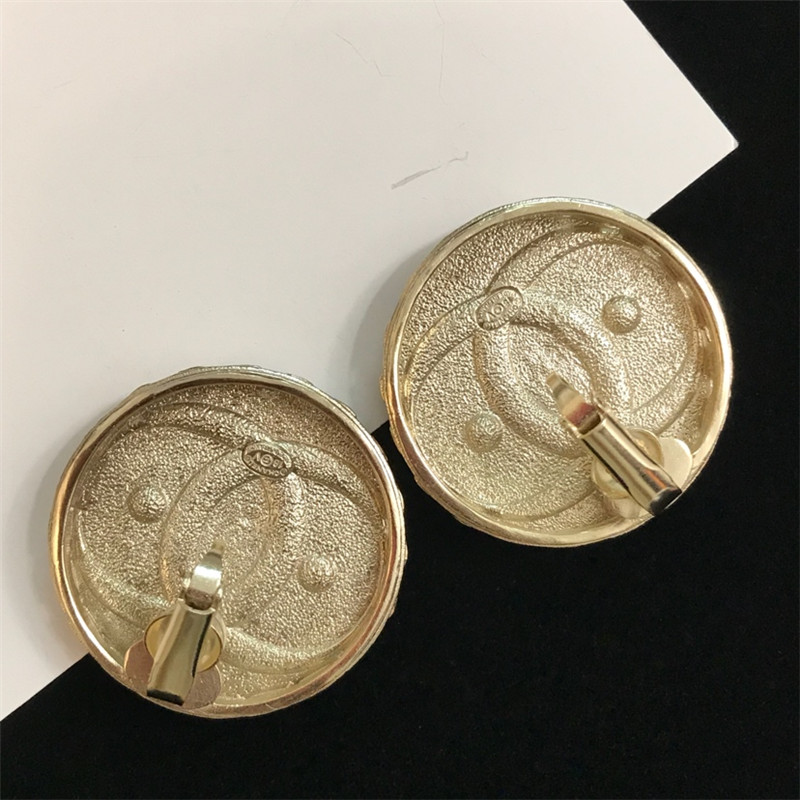 Ch**el double c logo earrings