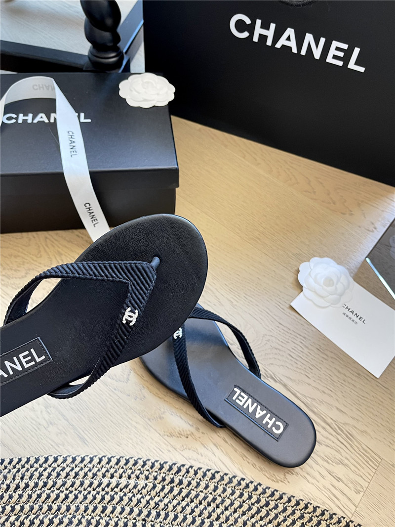Ch**el flat black flip flops