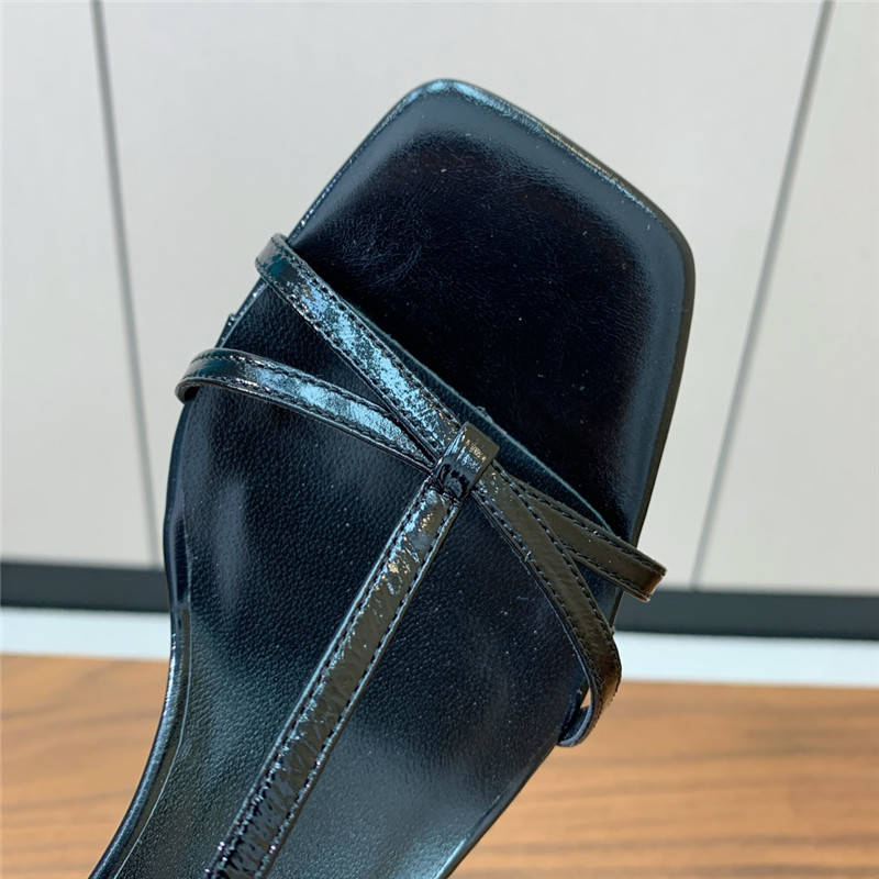 The R0w black patent leather wedge sandals