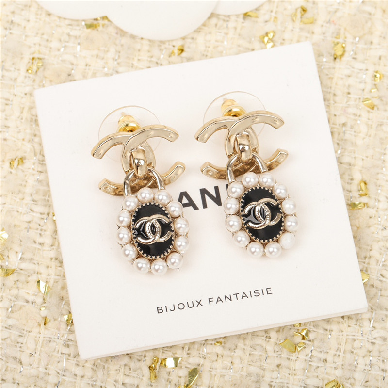 Ch**el double c lock oval pearl earrings