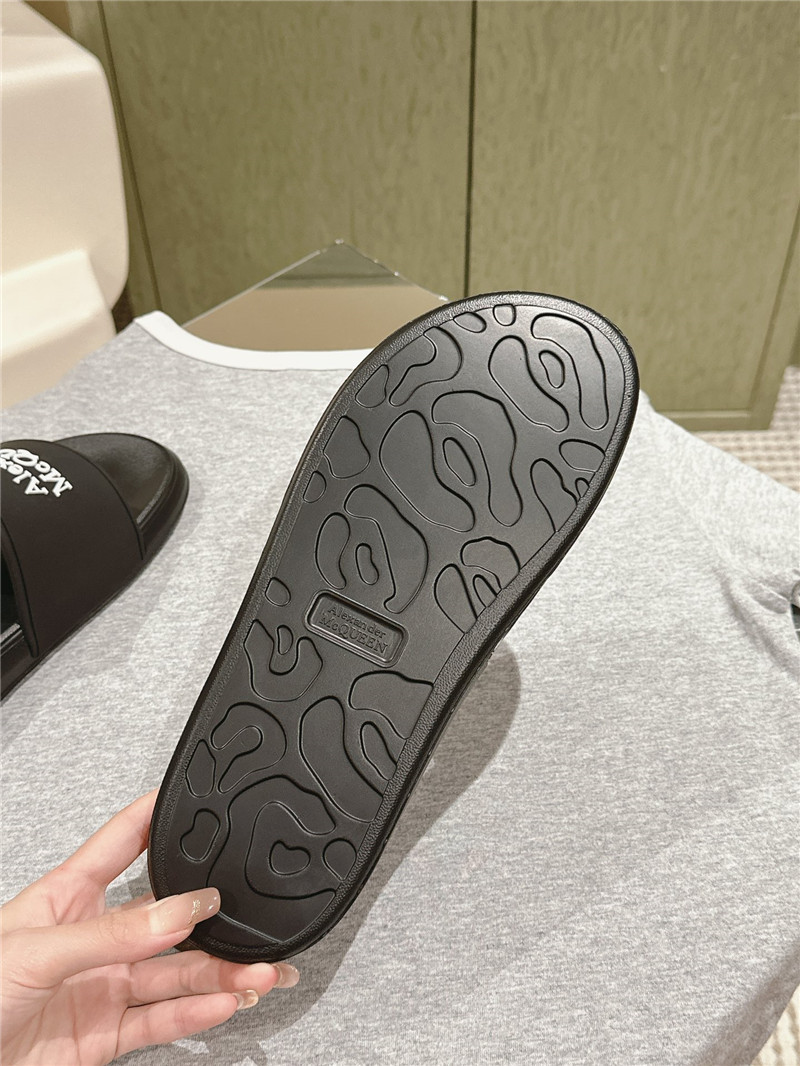 a1exa*der Mcqv*en black logo slide