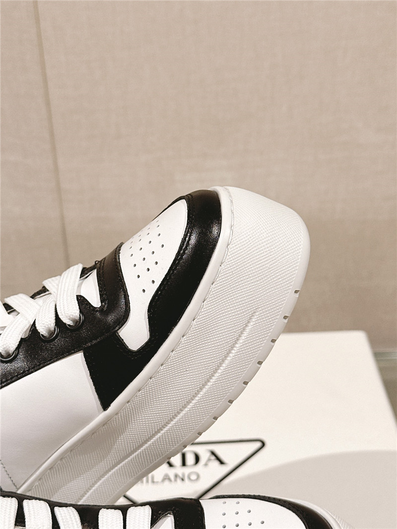 Pra*a black and white lace-up platform sneakers