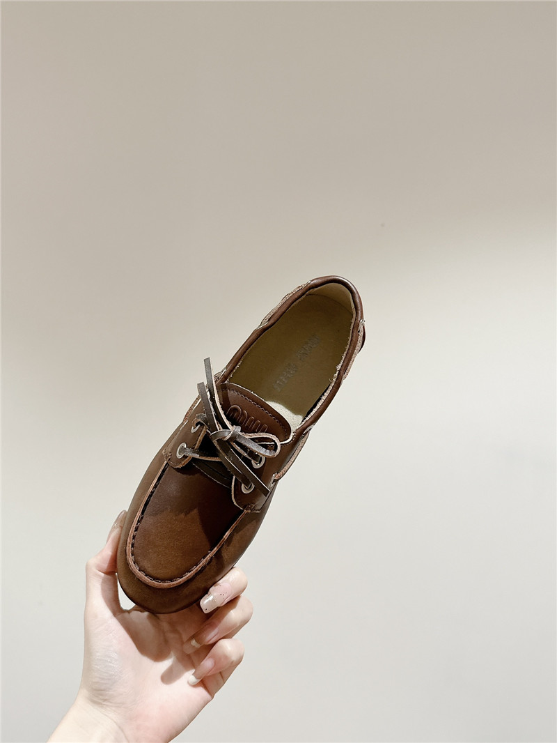 Miu Miu Bleached Leather Loafers