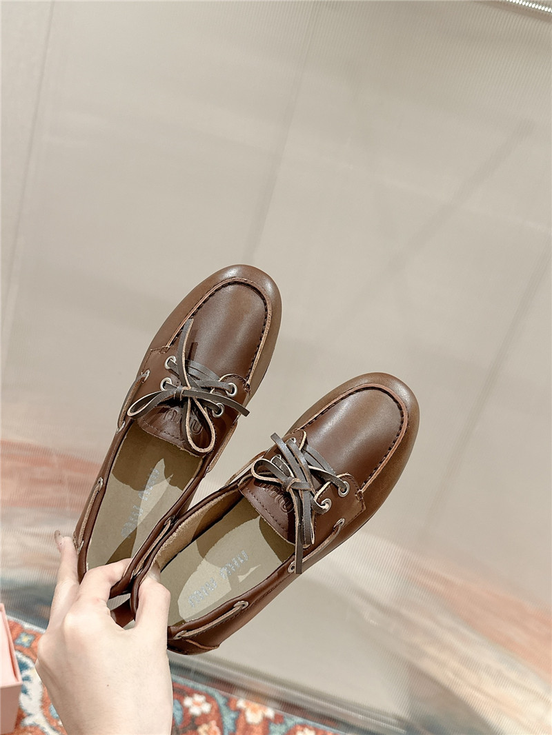 Miu Miu Bleached Leather Loafers