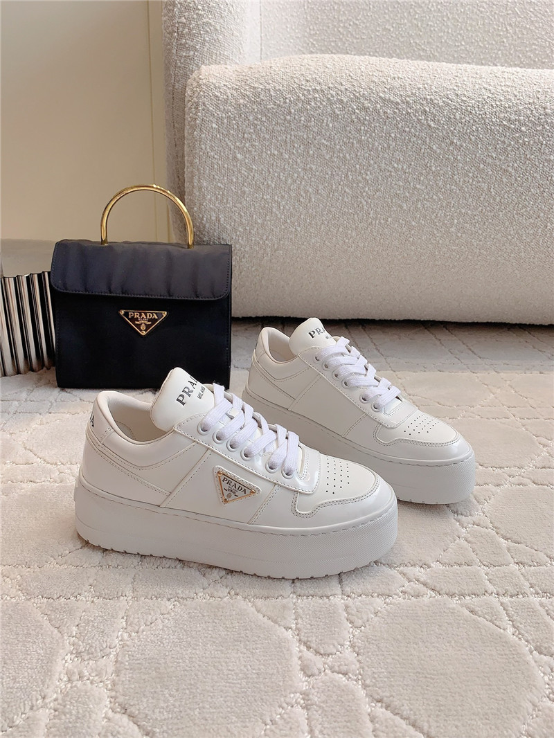 Pra*a triangle-logo white lace-up sneakers