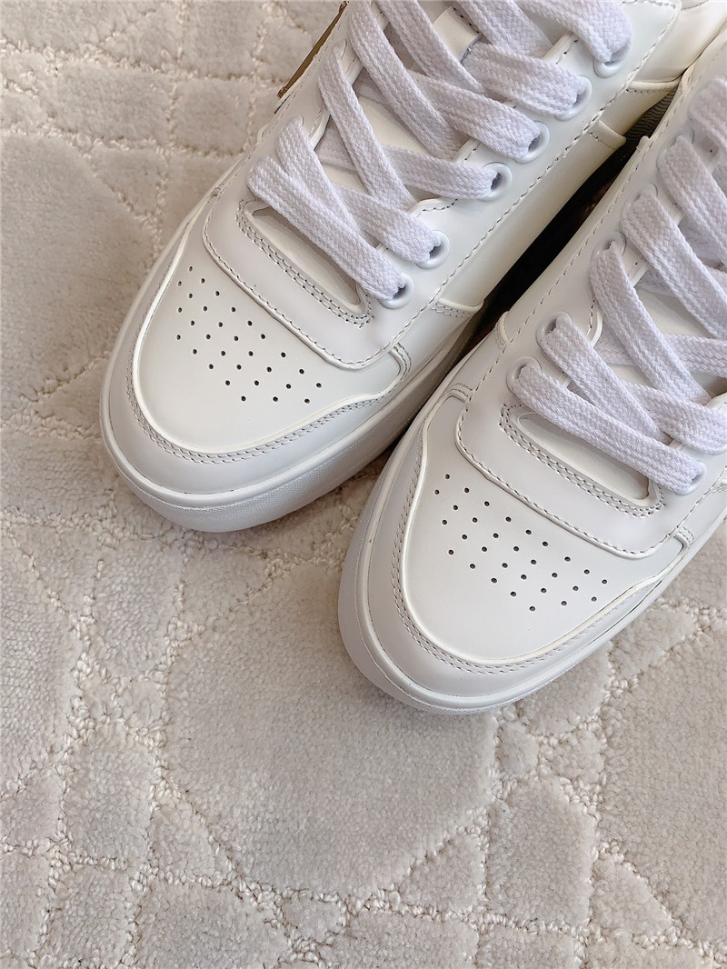 Pra*a triangle-logo white lace-up sneakers