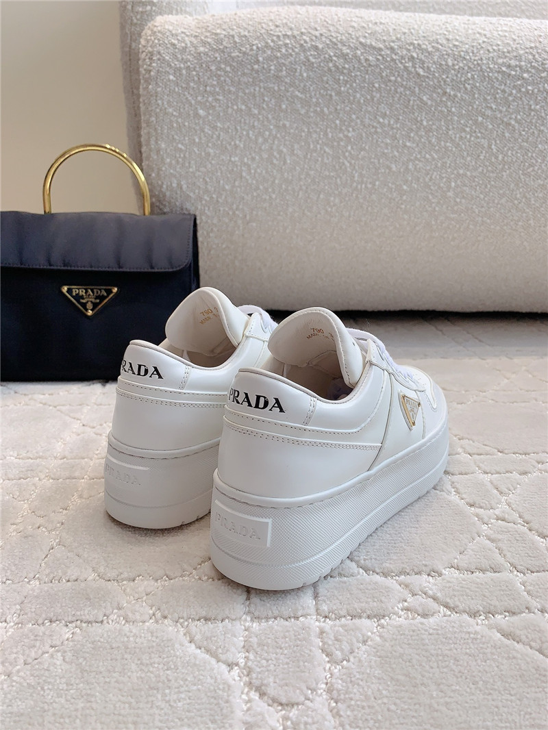 Pra*a triangle-logo white lace-up sneakers