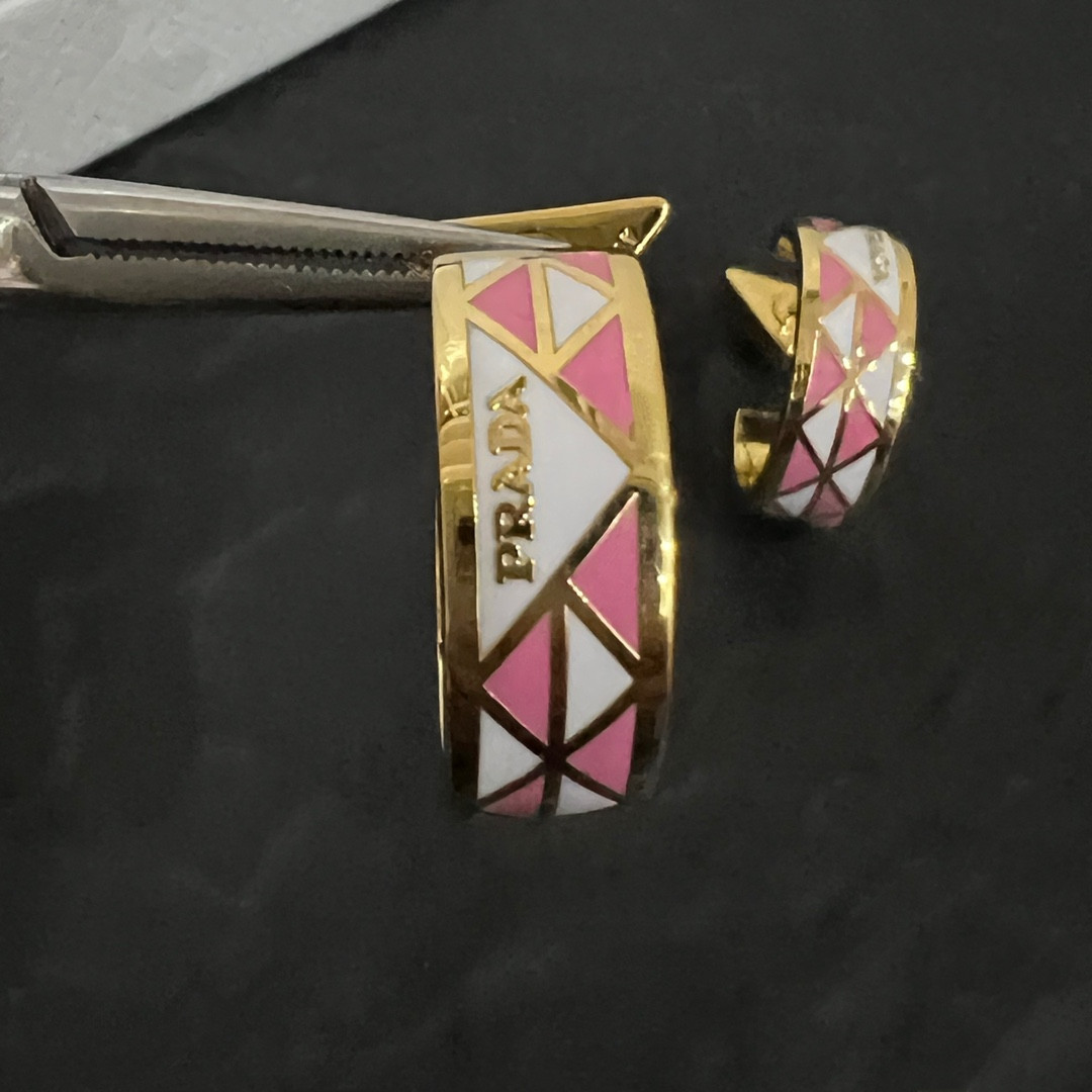 Pra*a triangle earrings