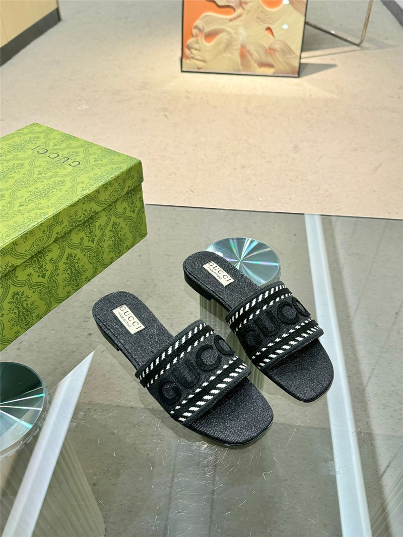 Gvc*1 slide with script in light black denim