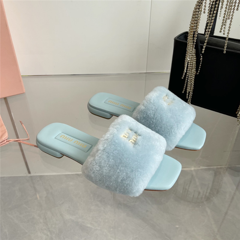 Miu Miu Blue Matelassé Fur Slides with Metal Lettering