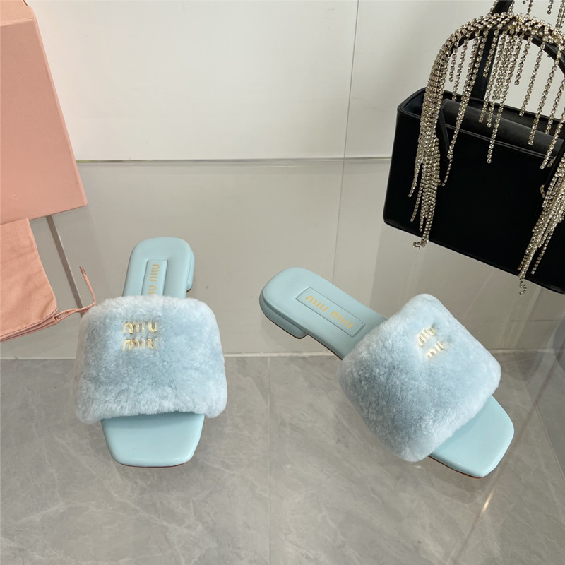 Miu Miu Blue Matelassé Fur Slides with Metal Lettering