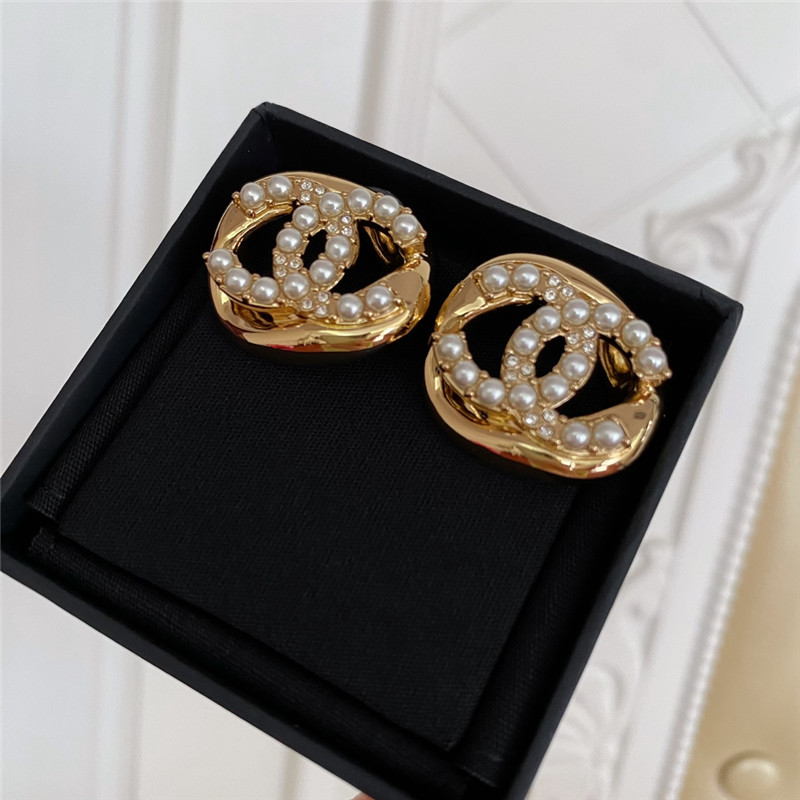 Ch**el hollow twisted sugar cube earrings