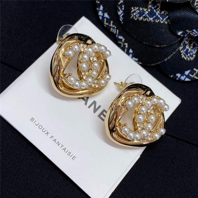 Ch**el hollow twisted sugar cube earrings