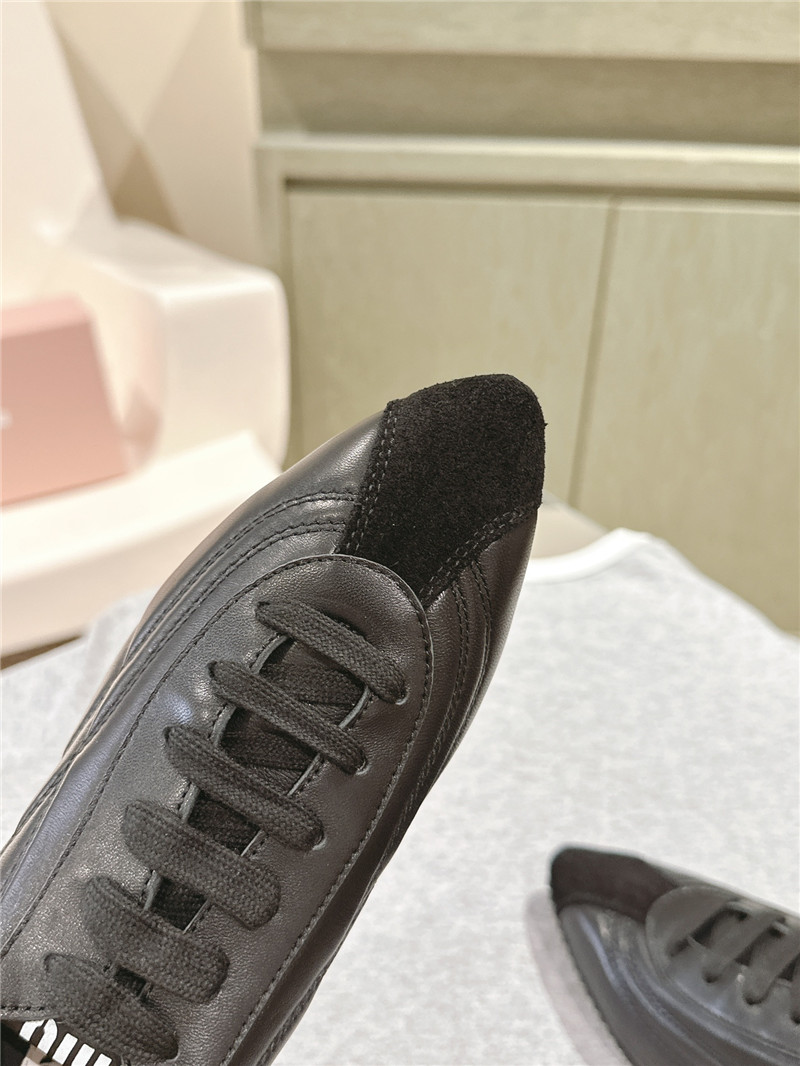 Miu Miu Point Toe Quilted Leather Sneakers in Black