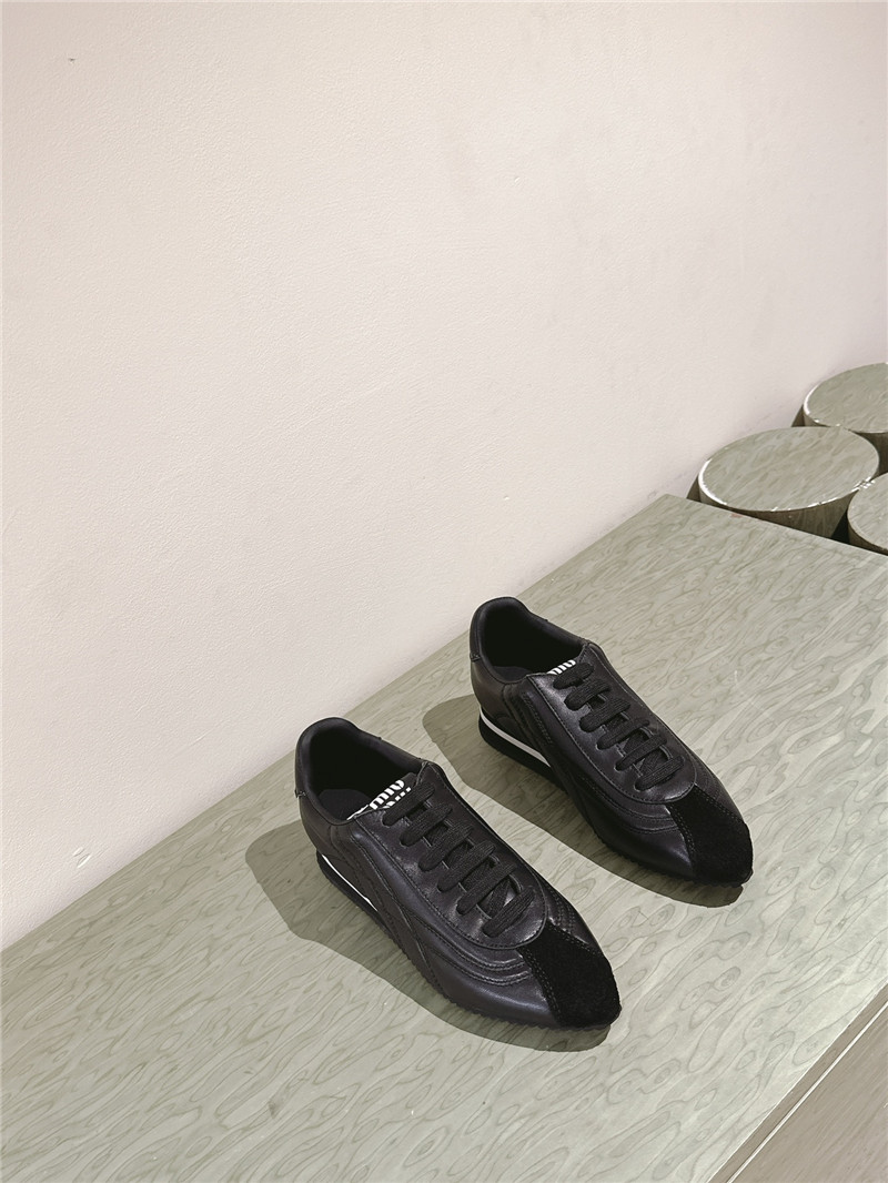 Miu Miu Point Toe Quilted Leather Sneakers in Black