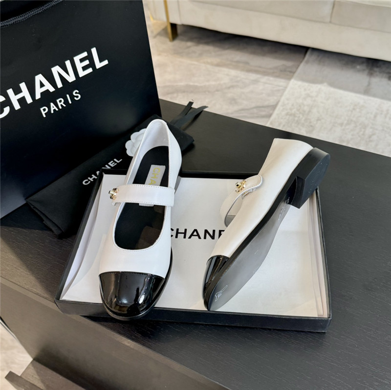 Ch**el gold interlock mary janes in white and black calfskin