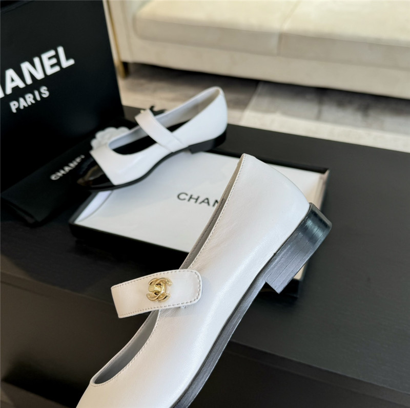 Ch**el gold interlock mary janes in white and black calfskin