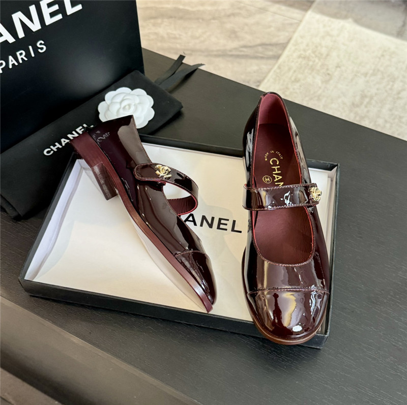 Ch**el gold interlock mary janes in burgundy patent calfskin