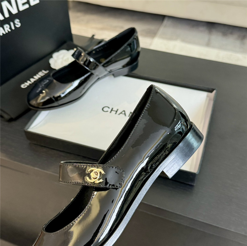 Ch**el gold interlock mary janes in black patent calfskin