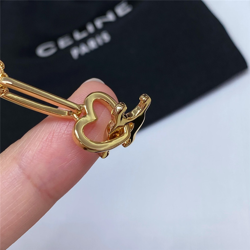 Ce1i*e arc de triomphe heart necklace