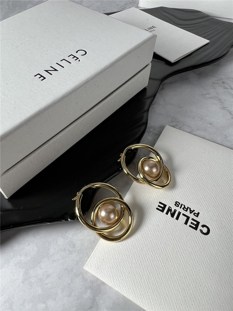Ce1i*e double loop pearl earrings