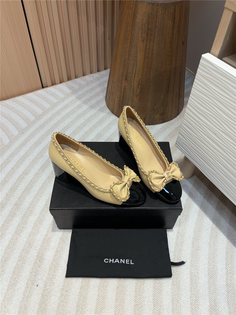 Ch**el bow chain trim ballet pumps in beige and black leather