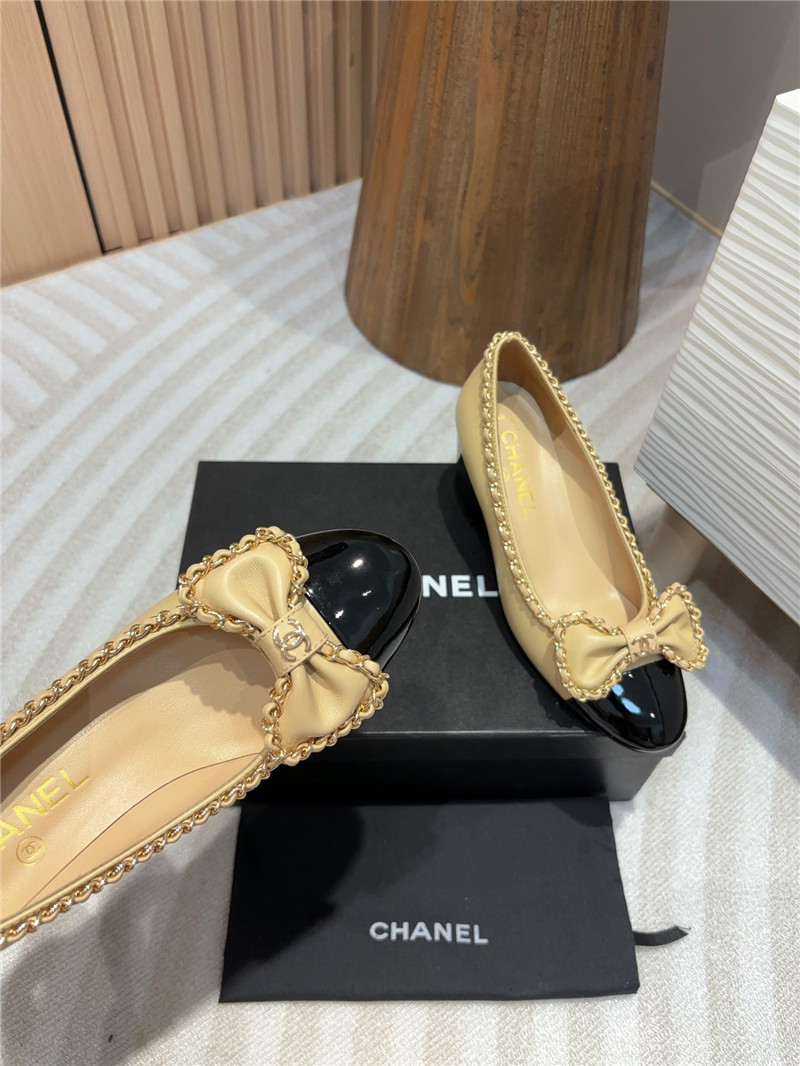 Ch**el bow chain trim ballet pumps in beige and black leather